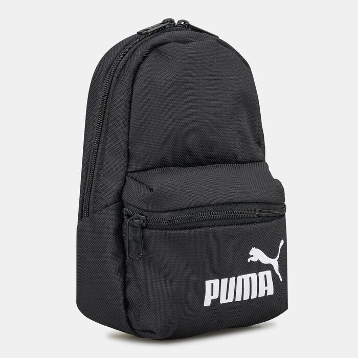 A black PUMA men's mini backpack with a front zip pocket and the PUMA logo on the front. It appears to be made of polyester fabric and has a structured, upright design.